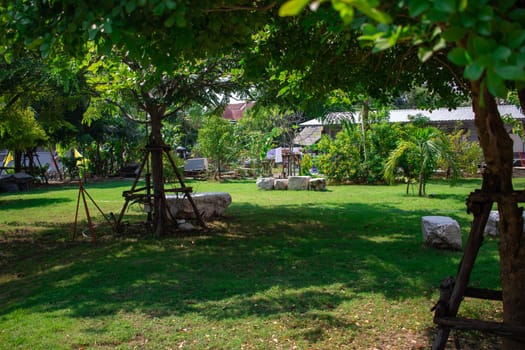 The temple's garden is surrounded by natural trees. Is a green space for people in the area