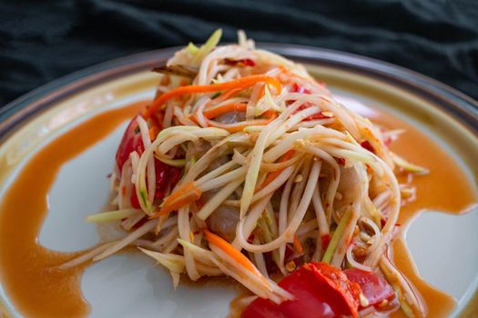 Papaya Salad menu, the main ingredient is papaya Is healthy food You can find it in street food stalls, a local dish in Thailand It is a popular food.