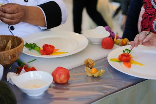 fruit vegetable carving. food decoration artwork in 'Thailand
