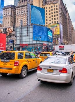 NEW YORK CITY - JUNE 11, 2013: Manhattan traffic on a hot sunny day.