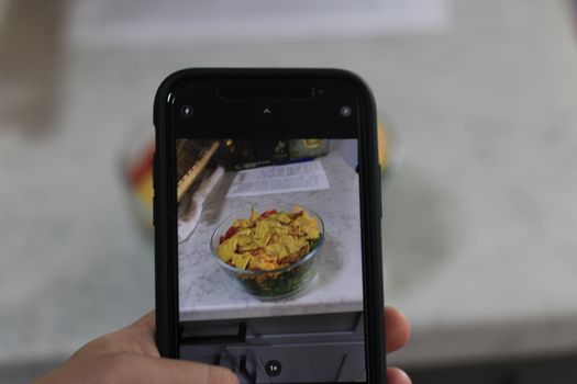 Taking a photo on kitchen counter of a burrito bowl. High quality photo