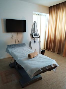 The interior of the massage room. Massage couch.