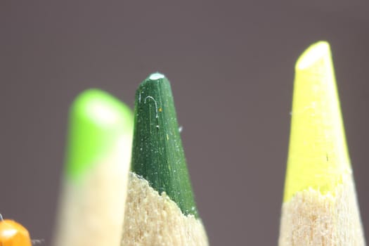 close up of sharpened pencil.Macro view of the tip of the pencil on a black background.