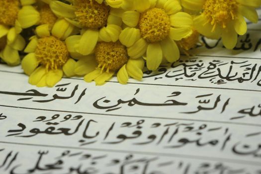 Chuncheon South Korea 24th October 2020: Closeup shot of Islamic Book Quran with golden arabic calligraphy that means Al-Quran, the Holy Quran