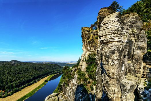 Scenic view of the Bastei rock formation, known as Saxon Switzerland near Dresden, view of the Elbe River, Saxony, Germany.