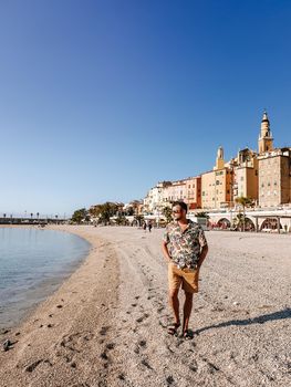 Menton France colorful town French Rivera, colorful old town Menton on french Riviera, France. Europe, young guy visit Menton during vacation