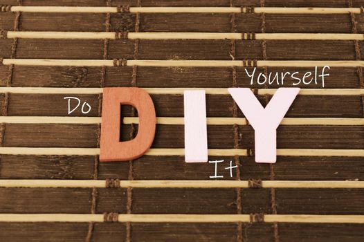 An example of an English acronym for Do It Yourself written as DIY.