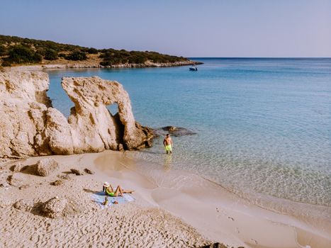 Tropical beach of Voulisma beach, Istron, Crete, Greece ,Most beautiful beaches of Crete island -Istron bay near Agios Nikolaos drone aerial view
