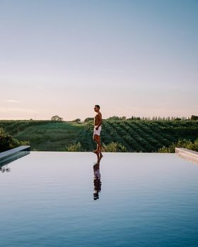 Luxury resort with a view over the wine field in Selinunte Sicily Italy. infinity pool with a view over wine fields in Sicilia