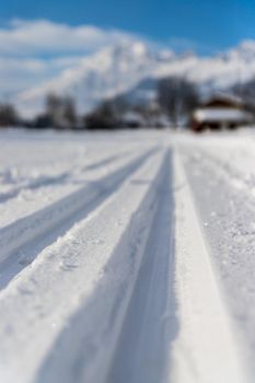 Cross-country skiing slope in Austria, beautiful mountain scenery, blurry background