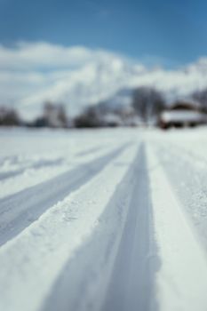 Cross-country skiing slope in Austria, beautiful mountain scenery, blurry background