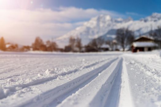 Cross-country skiing slope in Austria, beautiful mountain scenery, blurry background