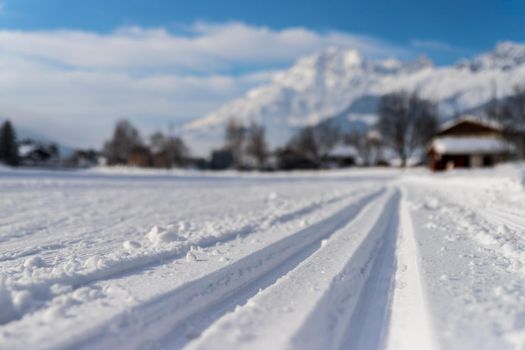 Cross-country skiing slope in Austria, beautiful mountain scenery, blurry background