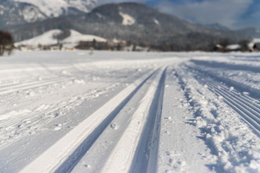 Cross-country skiing slope in Austria, beautiful mountain scenery, blurry background