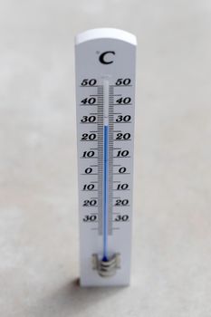 Thermometer close up picture in summer time, blurry background