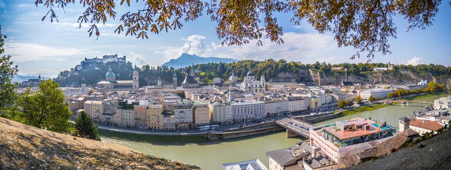 Panorama of Salzburg historic district at autumn time, colorful leaves and colors with sunshine, Austria