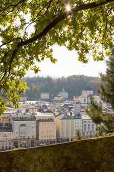 Salzburg historic district at autumn time, colorful leaves and colors with sunshine, Austria