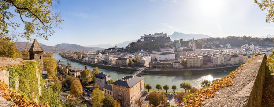 Panorama of Salzburg historic district at autumn time, colorful leaves and colors with sunshine, Austria