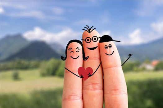 Painted fingers happy family concept making holidays in nature