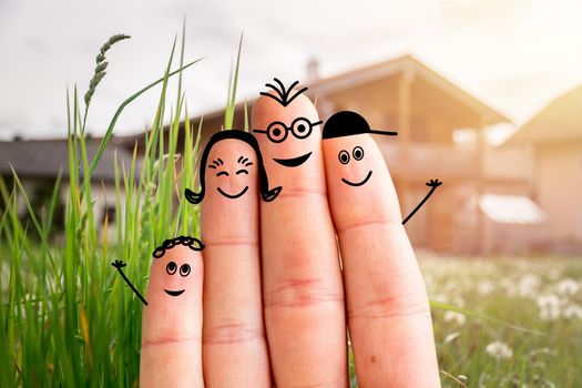 Painted fingers happy family concept moving into a new home
