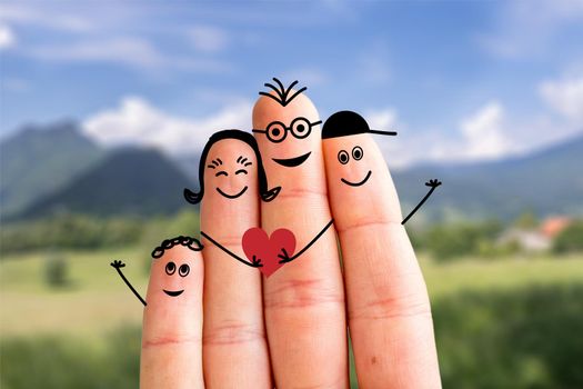 Painted fingers happy family concept making holidays in nature