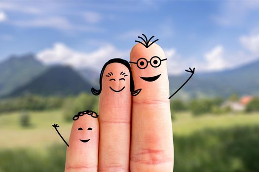 Painted fingers happy family concept making holidays in nature