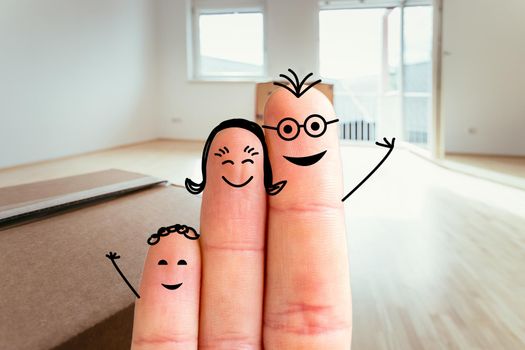 Painted fingers happy family concept moving into a new home