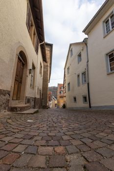 Cobbled road with historic houses in Meisenheim, Rhineland-Palatinate, Germany 