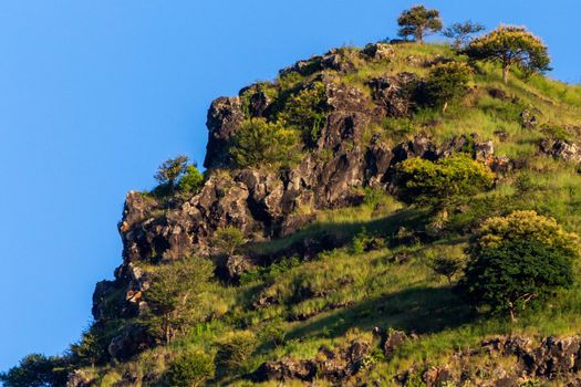 Landscape on Seychelles island Mahe with mountain, rocks and trees