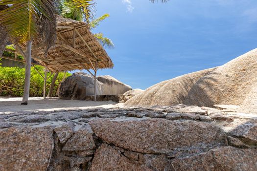 Beautiful beach Anse Source D'Argent on Seychelles island La Digue with white sand, blue water, granite rocks on the beach and blue sky with white clouds