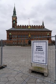 Copenhagen, Denmark - December 31, 2020: The town hall square is locked with barriers for New Year's celebration due covid-19.