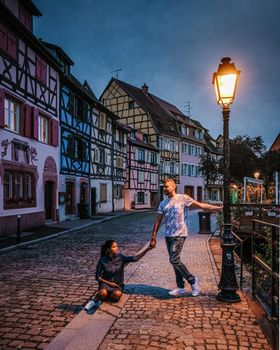 Colmar romantic town in France, couple visit Colmar. France Europe
