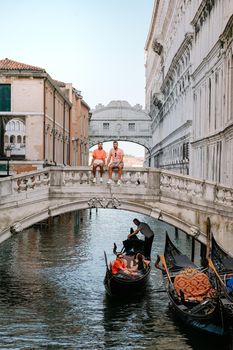 Italy Venice, almost empty city of Venice during summer 2020 with the covid 19 pandemic surge in Italy. Europe Venzia, couple on city trip in Venice Italy