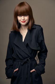 Beige background romantic brunette Light skin black coat