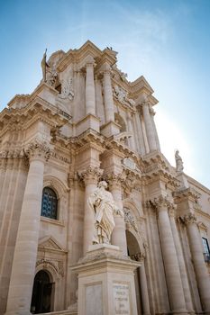 Ortigia in Syracuse Sicily Italy October 2020 in the Morning. Travel Photography from Syracuse, Italy on the island of Sicily. Cathedral Plaza and market with people wearing face protection during the 2020 pandemic covid 19 corona virus