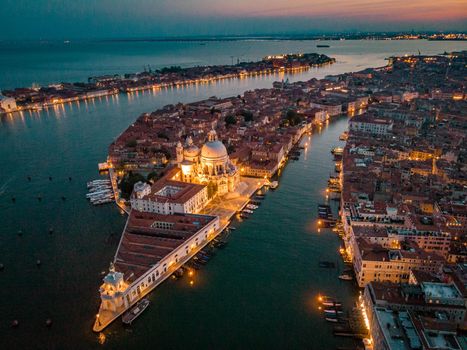 Venice from above with drone, Aerial drone photo of iconic and unique Saint Mark's square or Piazza San Marco featuring Doge's Palace, Basilica and Campanile, Venice, Italy. Europe