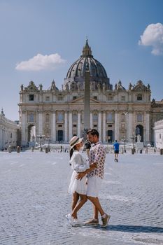 St. Peter's Basilica in the morning from Via della Conciliazione in Rome. Vatican City Rome Italy. Rome architecture and landmark. St. Peter's cathedral in Rome. Couple on city trip