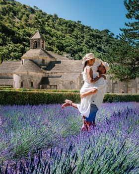 couple on vacation in the Provence France visiting the lavender fields of the Provence France. Europe