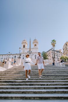 The Spanish Steps in Rome, Italy. The famous place is a great example of Roman Baroque Style. Italy couple on city trip in Rome