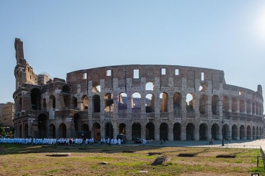 View of Colosseum in Rome and morning sun, Italy, Europe. 