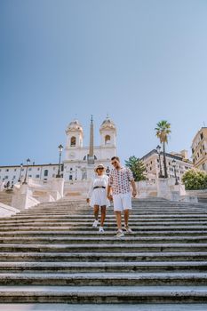 The Spanish Steps in Rome, Italy. The famous place is a great example of Roman Baroque Style. Italy couple on city trip in Rome