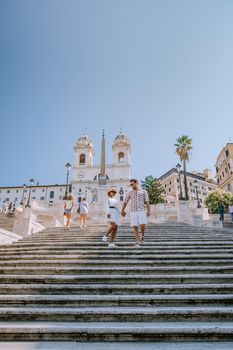 The Spanish Steps in Rome, Italy. The famous place is a great example of Roman Baroque Style. Italy couple on city trip in Rome