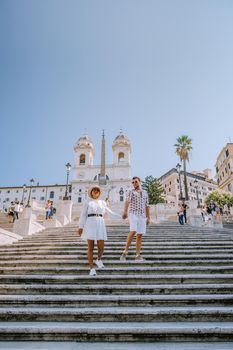 The Spanish Steps in Rome, Italy. The famous place is a great example of Roman Baroque Style. Italy couple on city trip in Rome
