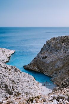 Crete Greece Seitan Limania beach with huge cliff by the blue ocean of the Island of Crete in Greece, Seitan limania beach on Crete, Greece. Europe