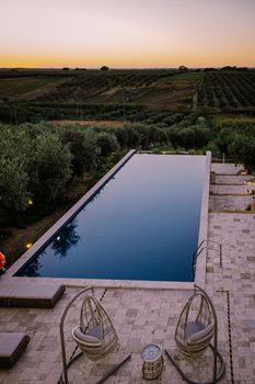 Luxury resort with a view over the wine field in Selinunte Sicily Italy. infinity pool with a view over wine fields in Sicilia