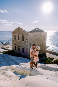 Punta Bianca, Agrigento in Sicily Italy White beach with old ruins of an abandoned stone house on white cliffs. Sicilia Italy, couple on vacation in Italy