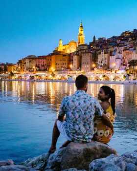 Menton France colorful town French Rivera, colorful old town Menton on french Riviera, France. Europe, couple men and woman on vacation in Menton