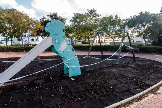 childrens playground area taped off during covid outbreak