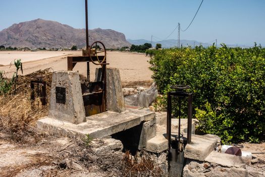 old sluice gates on spanish orange plantation or grove