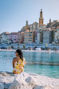 Menton France, woman on vacation at the Cote d Azur France, View on old part of Menton, Provence-Alpes-Cote d'Azur, France Europe